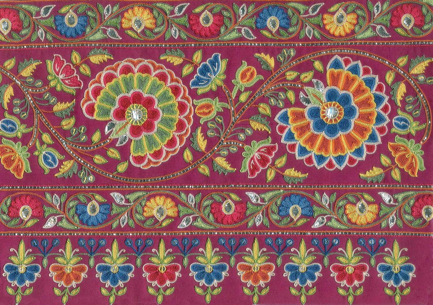A_variety_of_floral_motifs_embroidered_with_miniature_chain_stitch._Textile_Courtesy_Asif_Shaikh